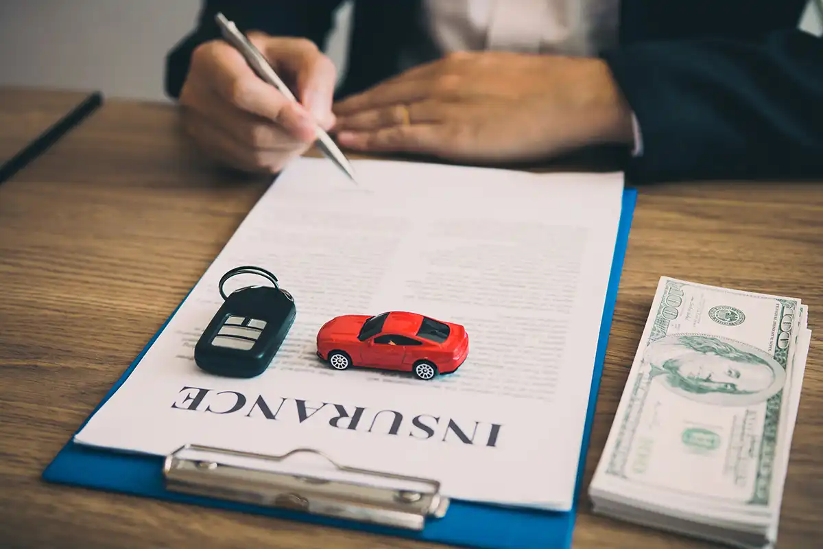 Signing auto insurance agreement